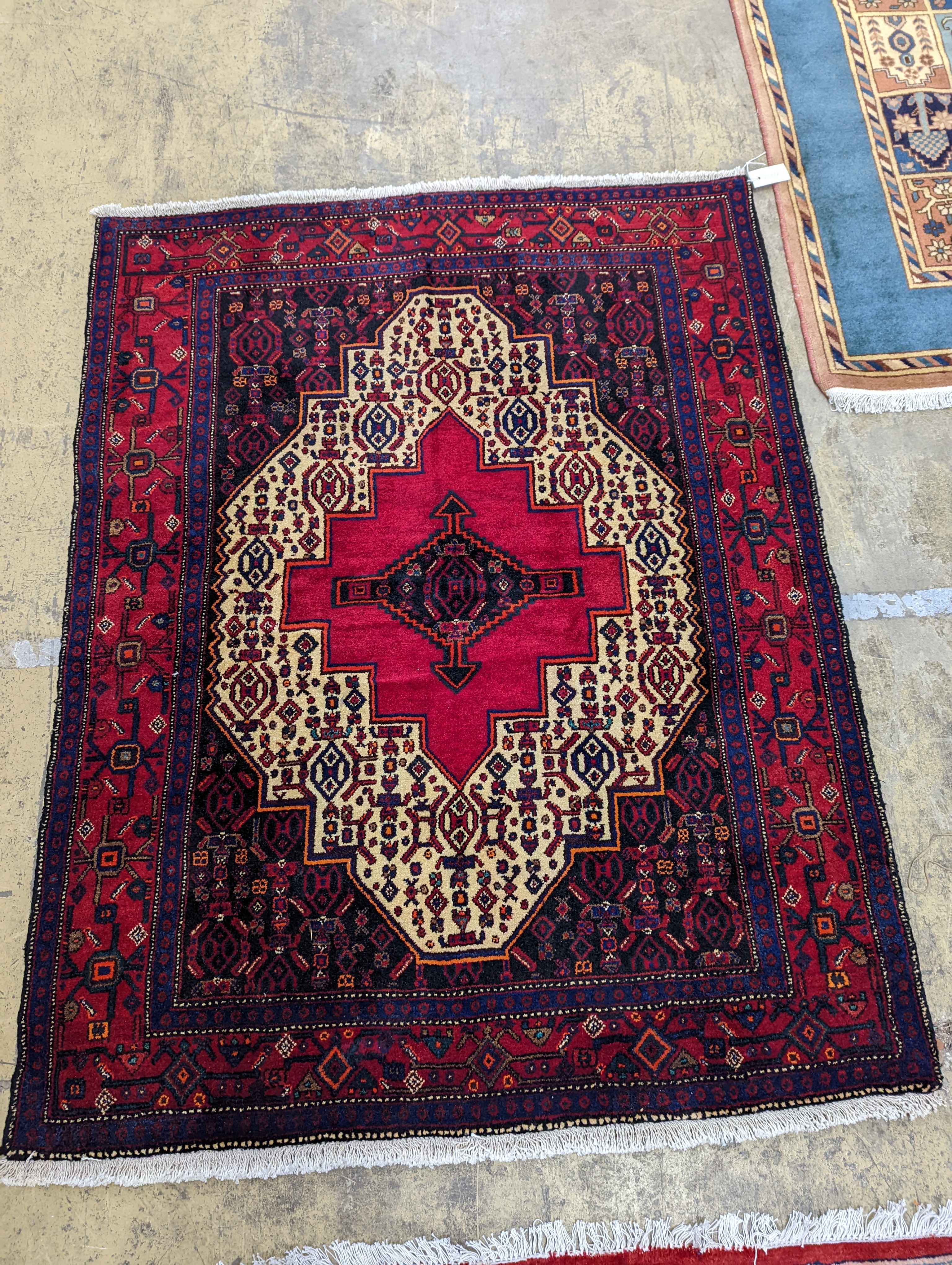 A Shiraz rug, 150 x 120cm